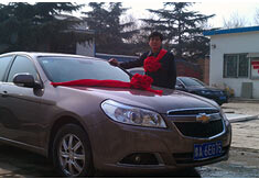 超前涂料獎勵員工轎車，真石漆生產(chǎn)廠家！